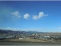 Blick von der I70 auf Golden - hier ist blauer Himmel und in den Bergen schneit's